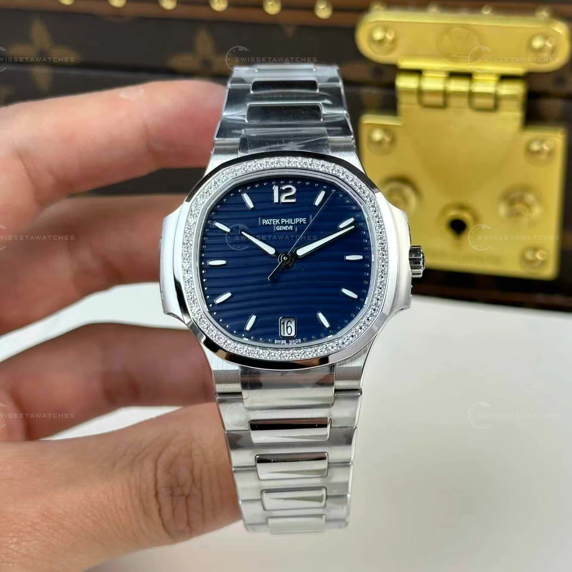 Patek-Philippe-Nautilus-7118-Blue-Dial-Stone-set-Bezel.jpg